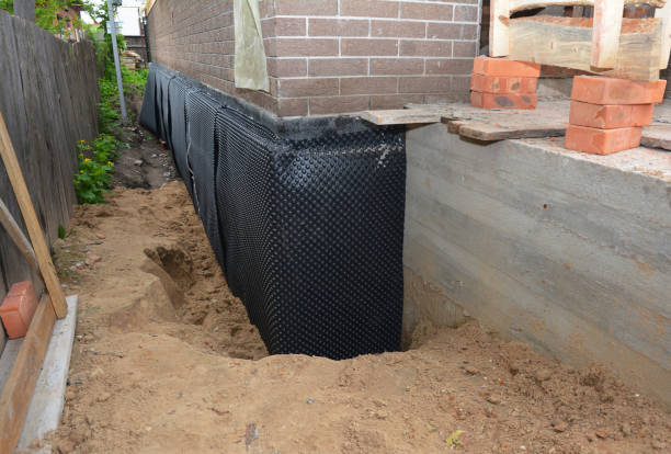 SJ Waterproofing Pros technician performing targeted Sump Pump Installation assessment in Grimsley, TN